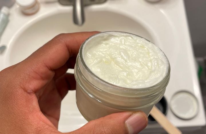 Observing the consistency of the good organic shaving cream