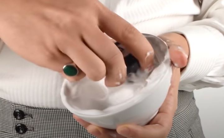 Mixing the shaving cream to create a foamy-rich lather